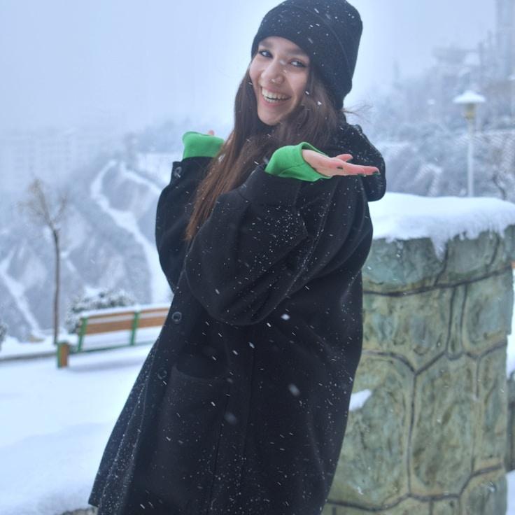 Alex Rivera, Lead Design Curator at TranquilRiverMeadow, reviewing corporate floral arrangements